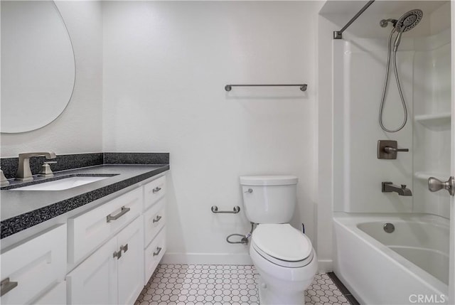 full bath with toilet, baseboards, vanity, and tub / shower combination