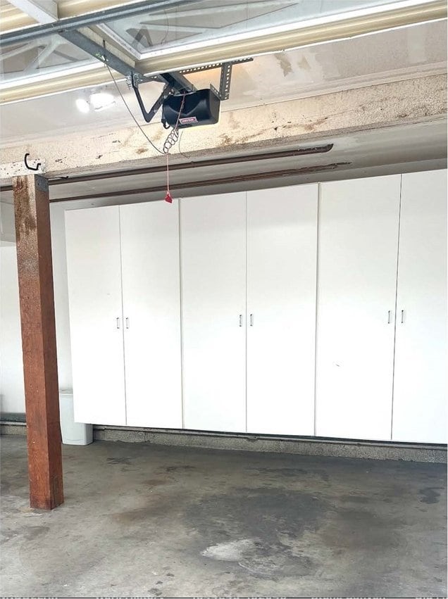 garage featuring a garage door opener