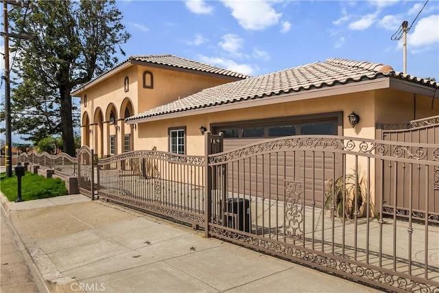 view of gate featuring a fenced front yard