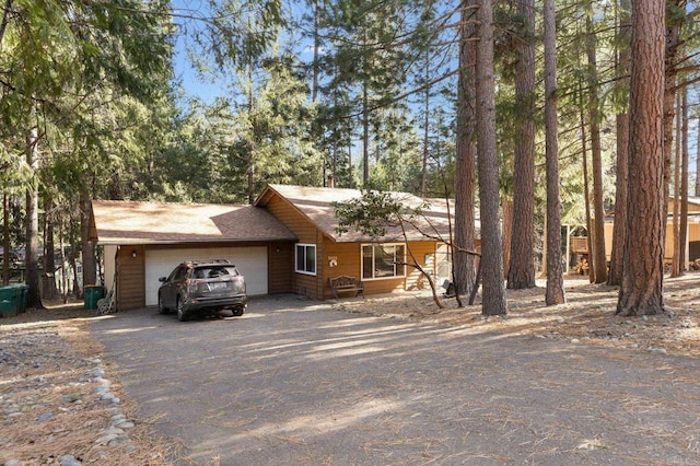 view of front of home featuring driveway and an attached garage