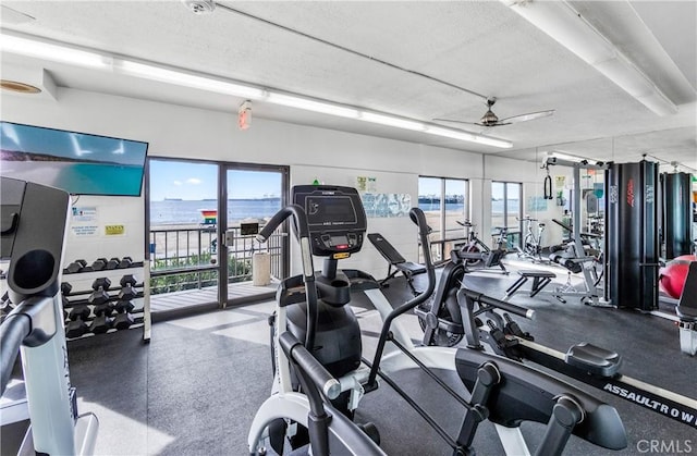 gym with a ceiling fan