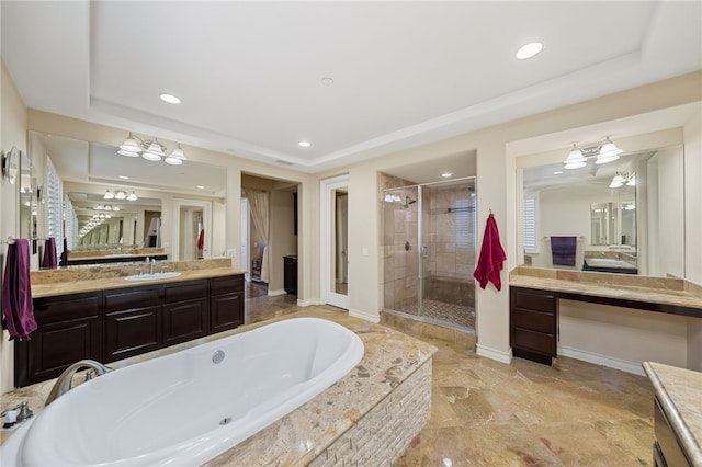 2514 Bulrush Cir, Corona, CA 92882 - bathroom with vanity, a shower stall, a garden tub, recessed lighting, and a tray ceiling