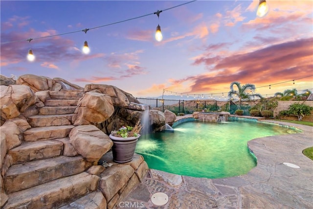 2514 Bulrush Cir, Corona, CA 92882 - pool at dusk featuring a fenced backyard