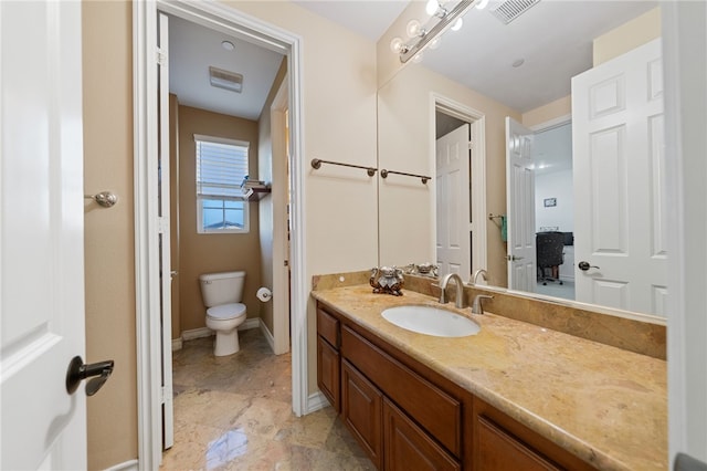 2514 Bulrush Cir, Corona, CA 92882 - bathroom with toilet, vanity, and baseboards