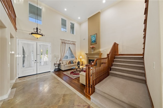 2514 Bulrush Cir, Corona, CA 92882 - entrance foyer featuring crown molding, stairs, baseboards, french doors, and recessed lighting