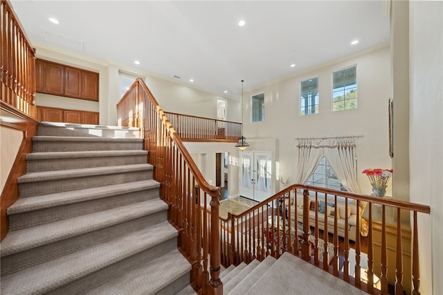 2514 Bulrush Cir, Corona, CA 92882 - stairway with ornamental molding, recessed lighting, and a towering ceiling