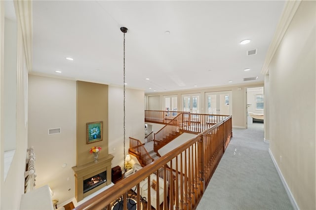 2514 Bulrush Cir, Corona, CA 92882 - hallway featuring ornamental molding, light colored carpet, an upstairs landing, recessed lighting, and baseboards