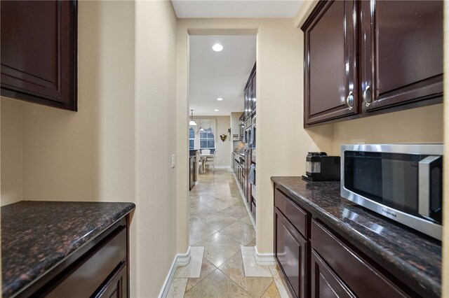 2514 Bulrush Cir, Corona, CA 92882 - bar featuring stainless steel microwave, baseboards, recessed lighting, and light tile patterned flooring
