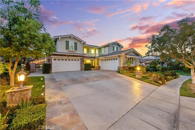 2514 Bulrush Cir, Corona, CA 92882 - traditional-style home with a garage, concrete driveway, and stone siding