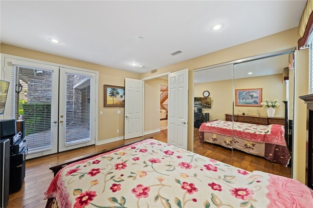 2514 Bulrush Cir, Corona, CA 92882 - bedroom featuring french doors, access to exterior, wood finished floors, recessed lighting, and baseboards