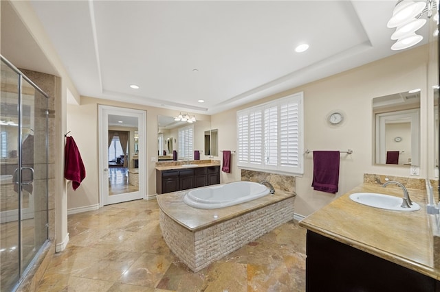 2514 Bulrush Cir, Corona, CA 92882 - full bath with a tray ceiling, a stall shower, two vanities, a bath, and recessed lighting