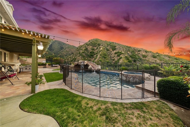 2514 Bulrush Cir, Corona, CA 92882 - view of pool featuring a mountain view, a patio, and a pool with connected hot tub