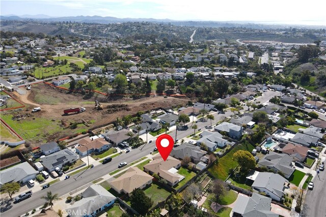 bird's eye view with a mountain view and a residential view