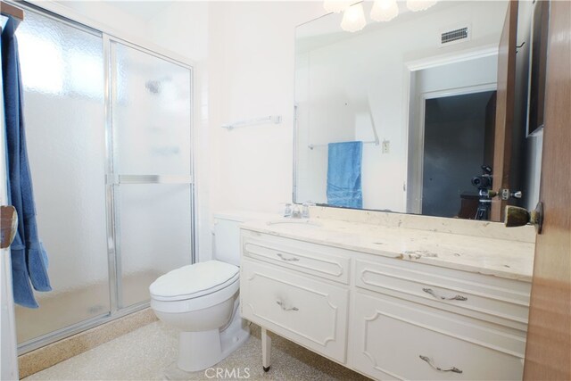 full bathroom with toilet, a stall shower, visible vents, and vanity