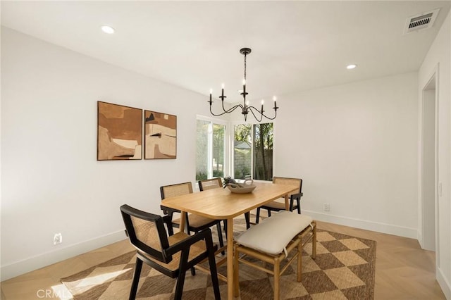 dining space with baseboards, visible vents, and recessed lighting