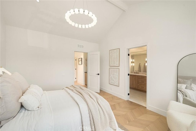 bedroom with ensuite bathroom, high vaulted ceiling, visible vents, baseboards, and beamed ceiling