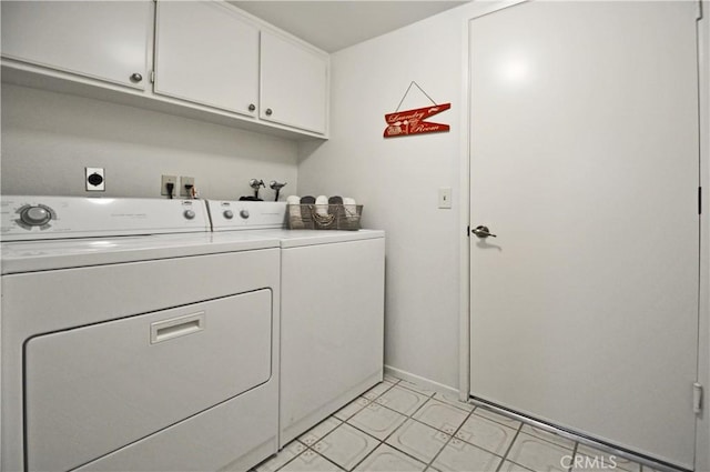 laundry area with cabinet space and independent washer and dryer