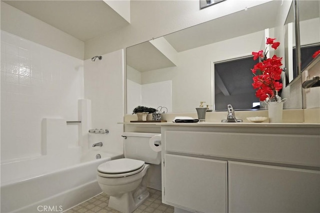 bathroom with tile patterned floors, vanity, toilet, and bathing tub / shower combination