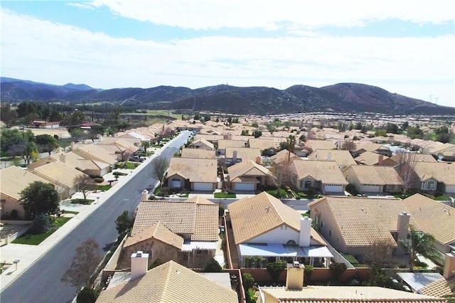 drone / aerial view featuring a mountain view and a residential view