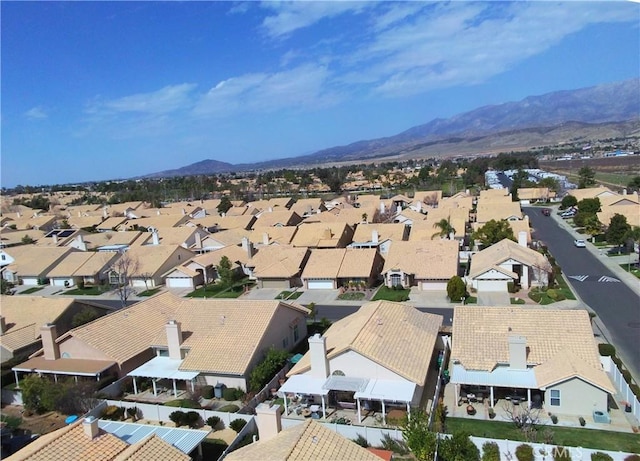 bird's eye view featuring a residential view and a mountain view