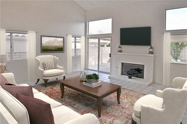 living room featuring a brick fireplace and high vaulted ceiling