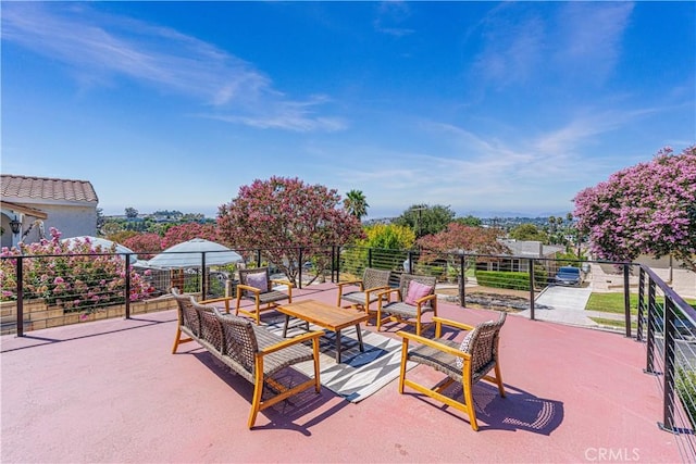 view of community with an outdoor living space