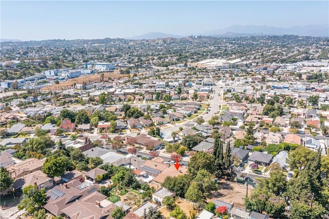 drone / aerial view with a residential view and a mountain view