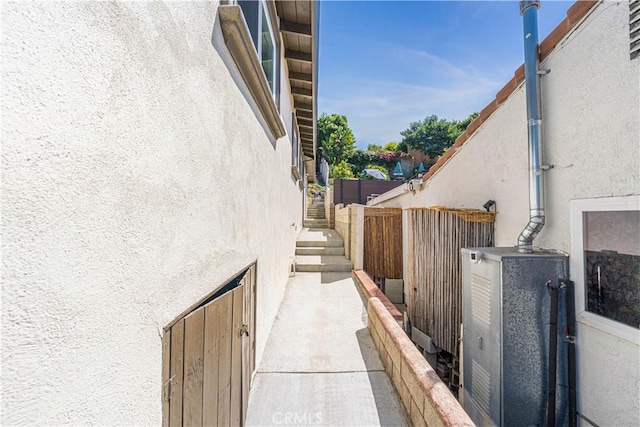 view of side of property with stucco siding