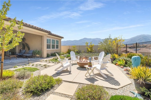 24674 Crestley Dr, Corona, CA 92883 - view of patio / terrace featuring a fire pit and a mountain view