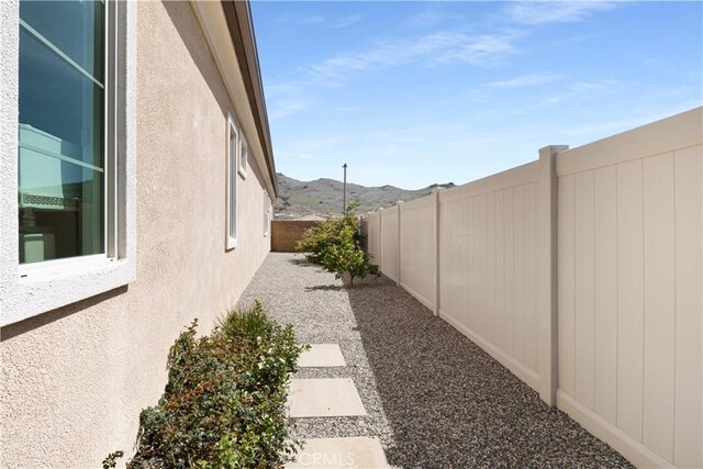 24674 Crestley Dr, Corona, CA 92883 - fenced backyard with a mountain view