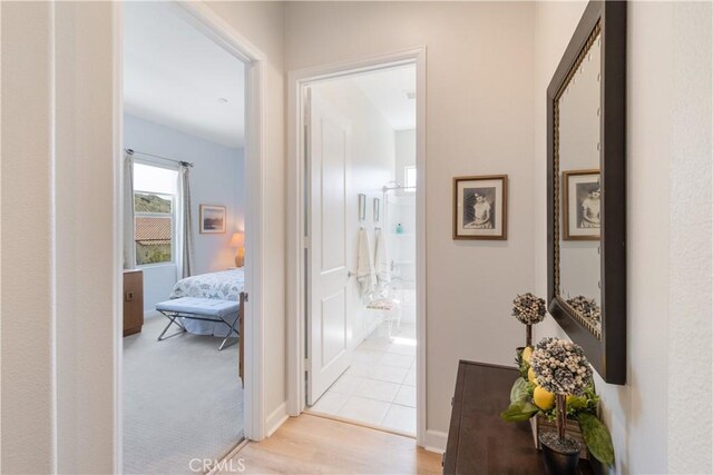 24674 Crestley Dr, Corona, CA 92883 - hallway featuring light wood-type flooring