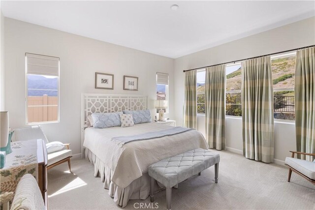 24674 Crestley Dr, Corona, CA 92883 - bedroom featuring light colored carpet and baseboards