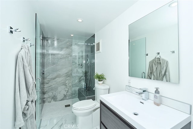 bathroom featuring a marble finish shower, recessed lighting, visible vents, toilet, and vanity