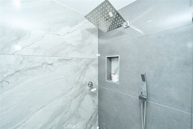 details with a tile shower