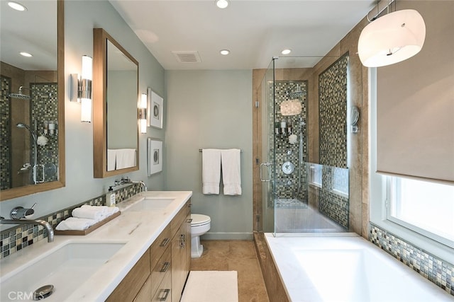 full bathroom featuring a sink, visible vents, and a shower stall