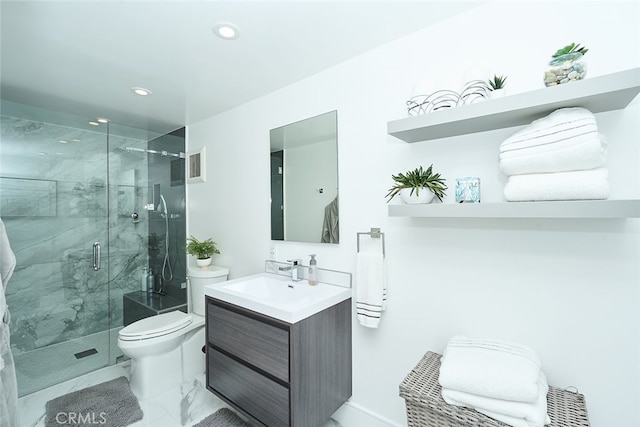 bathroom featuring a stall shower, visible vents, toilet, marble finish floor, and vanity