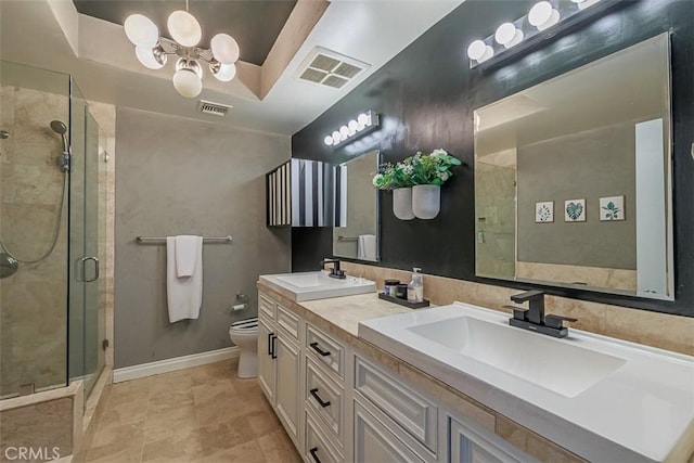 full bath with an inviting chandelier, a stall shower, visible vents, and a sink