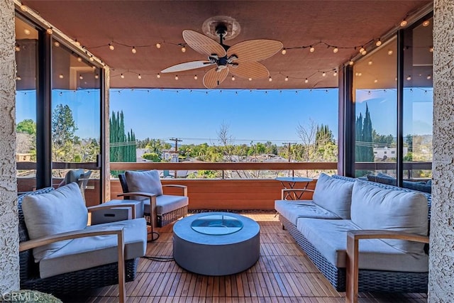 view of patio / terrace featuring an outdoor hangout area and a ceiling fan