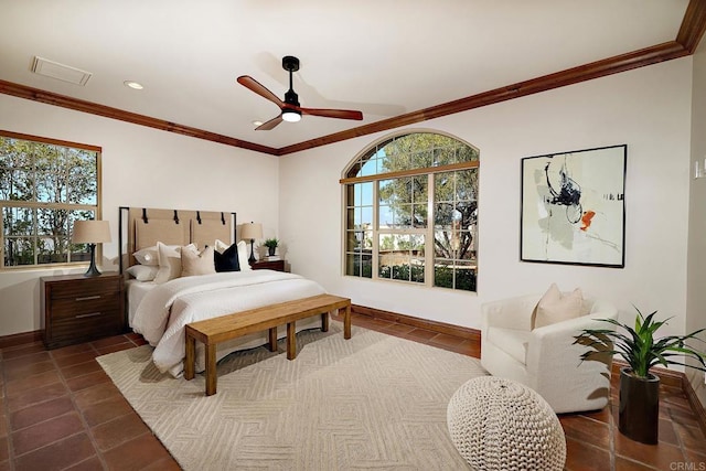 tiled bedroom with crown molding, multiple windows, a ceiling fan, and visible vents