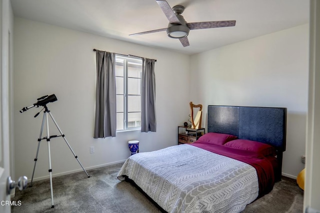 carpeted bedroom featuring ceiling fan and baseboards