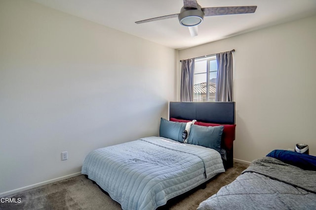 bedroom with carpet, baseboards, and ceiling fan