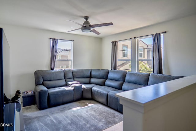 living room featuring a ceiling fan