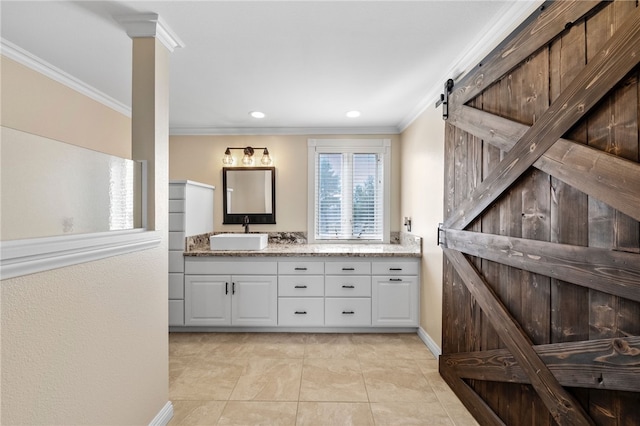 bathroom with recessed lighting, ornamental molding, vanity, baseboards, and tile patterned floors