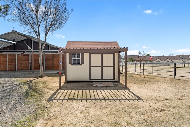 view of outbuilding with an outbuilding and an exterior structure