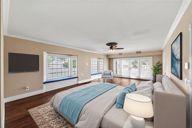 bedroom featuring dark wood-type flooring, access to exterior, crown molding, and baseboards