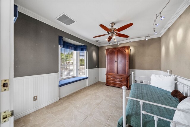 39725 Ivan Dr, Anza, CA 92539 - bedroom featuring track lighting, wainscoting, light tile patterned floors, ornamental molding, and ceiling fan
