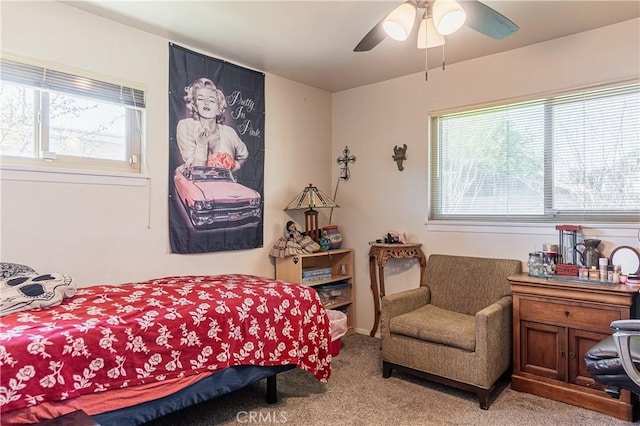 bedroom featuring carpet flooring and a ceiling fan