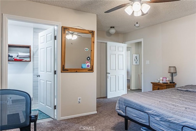 bedroom featuring a textured ceiling, carpet floors, ceiling fan, and baseboards