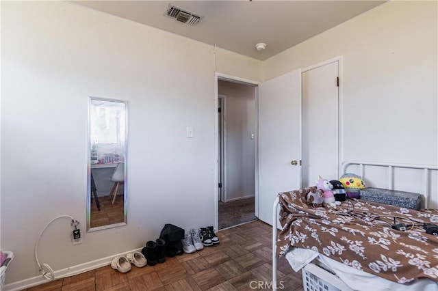 bedroom with visible vents