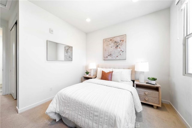 bedroom with light carpet, baseboards, and recessed lighting